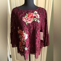 Nwt Dark Rich Burgundy Floral Lace Blouse With Beautiful Embroidered Appliqus And Scalloped Edge Raw Hem. Size L. Lace Is See Through. 23” In Length Bust 36” Lace Blouse With Floral Embroidery, Floral Embroidery Lace Tops For Fall, Lace Tops With Floral Embroidery For Fall, Red Lace Tops For Spring, Spring Red Blouse With Resham Embroidery, Red Blouse With Resham Embroidery For Spring, Lace Blouse With Resham Embroidery, Spring Lace Tops With Intricate Embroidery, Red Lace Blouse For Spring