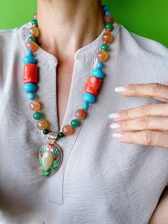 Colorful Beaded Turquoise Pendant Necklace, Large Tibetan Coral Agate Beads Necklace, African Chunky Gemstone Necklace, Gifts for Her Unique bohemian necklace for a special woman. ✴ WOULD YOU LIKE TO HAVE A STRIKING ACCESSORY TO ELEVATE YOUR LOOK IN A SINGLE GESTURE? This accessory will add value to the casual, most neutral looks and more elaborate compositions, allowing them to be elevated to another level. This is a one-of-a-kind handcrafted piece that every confident and empowered woman deser Turquoise Jewelry Necklace, Necklace African, Turquoise Pendant Necklace, Bohemian Necklace, Czech Crystal, Topaz Stone, Chunky Necklace, Green Gemstones, Turquoise Pendant