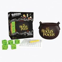 Bring fun and magic to a full rolling bubble with this bewitching twist on America's #1 Dice Game! Inspired by the classic Halloween comedy, YAHTZEE: Disney Hocus Pocus lets players "Shake, Roll, and Shout" spells and ingredients from Winifred's evil book with a custom cauldron dice cup to mix Dash of Pox, Dead Man's Toe, and more into winning combinations! For 1 or more players, ages 8+. Size: 6.13" x 5.25".  Color: Multicolor. Halloween Board Game, Hocus Pocus Disney, Disney Board Games, Yahtzee Game, Dice Cup, Disney Games, Classic Halloween, Disney Food Blog, Dice Games