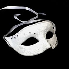 Simplistic for the man in the white rhinestones mask and chic for the woman in the white feather mask. The woman's fabricated texture and lacing veil are destined to pop out at any event. This masquerade mask is great for any occasion. White Formal Masquerade Mask For Carnival, Elegant White Masquerade Mask For Carnival, Elegant White Masquerade Mask For Mardi Gras, Elegant White Eye Mask, Elegant White Masquerade Mask For Weddings, White Venetian Eye Masquerade Mask, Venetian White Eye Masquerade Mask, White Venetian Eye Mask For Masquerade, Elegant White Masquerade Mask