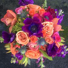 a bouquet of flowers sitting on the ground