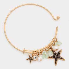 Gold Metal Charm Bangle Bracelet Statement Fashion Jewelry Accessories Size : 1.25" H, 2.25" D Dangling Charms Theme: Starfish Starfish M 2037 B Gold Starfish Bracelet With Starfish Charm, Elegant Starfish Bracelets For Beach, Adjustable Ocean-inspired Metal Jewelry, Adjustable Metal Bracelet With Star Charm, Adjustable Star-shaped Jewelry With Starfish Charm, Adjustable Starfish Charm Jewelry, Gold Ocean-inspired Starfish Bracelets, Gold Bracelet With Starfish Charm, Adjustable, Beach Jewelry With Adjustable Star Charm