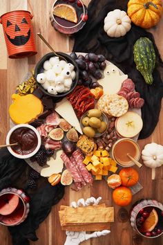 a wooden table topped with lots of food