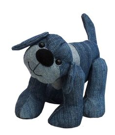 a blue dog stuffed animal on a white background