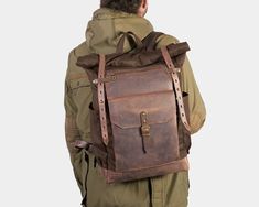 "Elegant city backpack for daily use, work and short travels. The bag was made of a 340 gramme / 12oz waterproof  British waxed canvas  (dry finish) and full-grain \"crazy horse\" Italian leather. ------ View other backpack models: http://etsy.me/1tNVC35 ------ COLOUR: Brown canvas / Brown \"crazy horse\" leather. - Big and roomy front pocket for quick excess outside.  Suitable for notebook, tablet, napkins, etc. - Additional secured pocket on top for keys, cards and small things. Suitable for p Waxed Canvas Leather Backpack For Outdoor, Vintage Waxed Leather Backpack, Adventure Waxed Canvas Backpack, Daily Use Waxed Canvas Backpack With Waxed Finish, Waxed Canvas Leather Backpack, Waxed Canvas Bag, Day Backpacks, City Backpack, Backpack Laptop