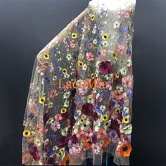 a dress with flowers on it and the name lacevine