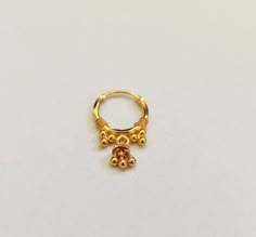 22k Gold Nose Ring, Nostril Ring, Indian Gold Nose Ring, Nose Jewellery, Gold Nose Ring, Gold Nose Hoop, Gold Nose Piercing, Solid Gold hoop Handmade indian 22k Solid Gold Nose Hoop, Gold Nose Ring, Pure Gold Genuine 22k Nose Ring. One of a kind Solid Gold Nostril Ring with dangling Tiny bell and balls. Metal: 22k Solid Gold Wire : 0.7mm goes in nose Inner diameter: 9mm mm Theme: indian Ethnic Ball design Note:- This order will take around 1-2 days for processing. We welcome custom orders as wel Gold Indian Nose Ring, Indian Gold Ring Designs, Gold Dangle Nose Ring, Nose Ring Dangle, Desi Nose Piercing, Gold Hoop Nose Ring, Diamond Nosepin, Nose Jewellery, Nose Ring Gold