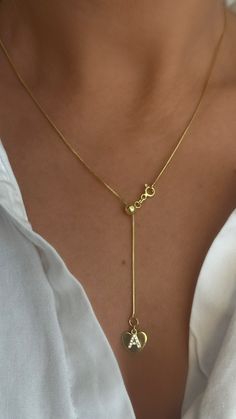 Elegant Adjustable Heart Chain Necklace, Adjustable Long Drop Necklace, Adjustable Yellow Gold Heart Pendant Necklace, Box Chain Lariat Necklace As Gift, Box Chain Lariat Necklace For Gift, Anniversary Necklace With Adjustable Snake Chain, Snake Chain Necklace With Adjustable Chain For Anniversary, Lariat Box Chain Necklace For Gift, Elegant Lariat Jewelry With Sliding Knot