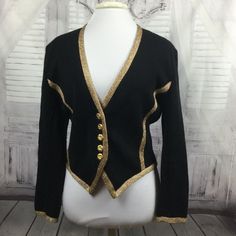 Size 40 Or Us 8 Shoulder: 19" Arms: 23" Bust: 20.5" Length: 22" Flat Lay Very Special Piece For Ysl, Couture Vintage, I Believe It's Wool With Metallic Gold Trim, A Bit Of A Military Look. Gold Buttons Down The Front, Sharp Cuts And Long Sleeve. I'd Call This More Of A Cardigan But You Could Say It's A Blazer As Well. Buttons Are Thin Metal, All Are Intact. Good Vintage Condition. Estimate Period: Early 90s Ysl Couture, Cardigan Blazer, Military Looks, Vintage Yves Saint Laurent, Early 90s, Couture Vintage, Colored Blazer, Gold Buttons, Black Cardigan