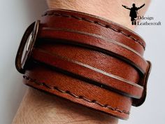 Leather Handmade Bracelet A handcrafted men's bracelet is an elegant addition to daily outfits. High-quality leather ensures durability and elegant appearance, and the handmade craftsmanship guarantees the uniqueness of each bracelet. Made of natural leather, the bracelet has two straps, which through the arrangement on the main wider strap, with a width of 4.5 cm, makes the product more three-dimensional. With three clasps at a length of 17 cm to 20 cm, the bracelet is flexible and easily adapts to each hand. It is perfect as a gift for a man or as a decoration for yourself. Leather Bracelets For Everyday Use, Everyday Leather Wristband With Leather Strap, Everyday Leather Wristband With Bracelet Strap, Everyday Leather Wristband With Strap, Everyday Leather Wristband, Leather Wristband For Everyday Use, Leather Bracelet With Wrist Strap For Everyday Use, Adjustable Waxed Leather Bracelet, Brown Leather Bracelet With Wrist Strap