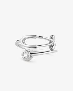 Made in certified sterling silver Use our Ring Sizer to find your perfect fit Band height: 14 mm Stone size: 3 mm genuine grade AAA white CZ