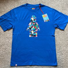 Men’s Lego Target T-Shirt. Size Small. Brand New With Tags. Perfect For Any Lego Lover Or A Summer Trip To Legoland! Blue Crew Neck Shirt With Screen Print, Lego Shirt Ideas, Lego Shirts, Lego T Shirt, Class Shirts, Ideas Fiesta, Lego Lovers, Batman Shirt, Class Shirt