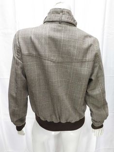 Scotch pattern Racer Jacket. Brown cuffs and waistband. Front button-flap pockets. Back yoke. Liner You will not find this collection in any other store. We only have a few left in stock. Mannequin is 5' 8" (175.26 cm), US size 4 wearing a US size 8 jacket. TOP HALF US Size 2 4 6 8 10 12 Bust (in.) 31.5 33 34.5 36 38.5 40 UK Size 6 8 10 12 14 16 Bust (cm) 80 84 88 92 98 104 Brown Collared Outerwear With Button Cuffs, Fitted Casual Tweed Jacket With Pockets, Fitted Casual Tweed Jacket, Fitted Button-up Tweed Jacket With Pockets, Casual Fitted Tweed Jacket With Button Closure, Fitted Brown Outerwear With Flap Pockets, Vintage Stand Collar Outerwear For Work, Vintage Outerwear With Stand Collar For Work, Fitted Outerwear With Pockets And Stand Collar