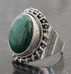 Free Shipping on All Orders Product Description:- PRODUCT CODE :- 0065 RING WEIGHT :- Approx 7.4 Gram SIZE :- All Size Are Available, choose from variation. METAL :- Pure Silver STONE :- Malachite PURITY :- 925 sterling Silver Ring can be customized on request and gemstone can be made to any gemstone you want. If You Need Faster Shipping, Please Contact us Please Make Sure to Include The Correct Address During Before Order. You Can return Item within 30 Days After Successful Delivery. We Offer 1 Oval Green Rings With Stone Setting, Green Oval Rings With Stone Setting, Green Oval Stone Setting Rings, Handmade Green Oval Crystal Ring, Handmade Green Oval Cabochon Ring, Oval May Birthstone Ring With Stone Setting, Oval Stone Setting Ring For May Birthstone, Handmade Green Oval Ring, Handmade Oval Green Ring