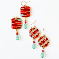 "Beautiful 24K Gold Plated Mid Century retro style earrings with tiny turquoise glass drop beads. Choose one of the two styles. The earrings measure 1.5\" long with 24K gold plated ear wires. Nickel and lead-free. The Details: 1.5\" long 24K gold plated enamel and epoxy shipped in a gift box" Bold Enamel Jewelry As A Gift, Bold Enamel Jewelry For Gifts, Bold Enamel Jewelry Gift, Handmade Vibrant Drop Earrings, Vibrant Handmade Drop Earrings, Vibrant Dangle Earrings With Ear Wire, Bold Handmade Gold Earrings, Bohemian Enamel Drop Earrings, Bohemian Colorful Earrings For Gift