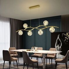 an elegant dining room with modern lighting fixtures