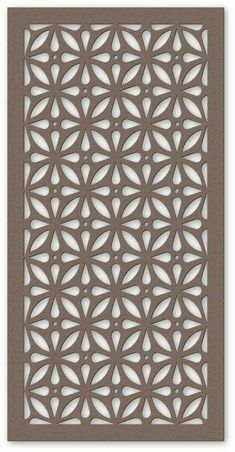 an intricate laser cutout pattern in brown and white