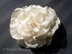 Ivory Magnolia LaLuna Silk Flower Bridal Hair Accessory, Wedding Hair Flower, Authentic Designer Headwear, Kentucky Derby Hat Flower LaLuna Abstract-Impressionist Magnolia delicate bridal hair flower accessory. Looks beautiful worn alone in hair, with a veil, or headband. Handmade in ivory satin organza.  Last image shows 'in hair' example of a 4 inch silk LaLuna Magnolia. Set on colibri hair clip. Other available attachments, http://floreti.biz/attachments.html Dimensions: About 3-1/2 inches in Elegant Flower-shaped Hair Accessories With Handmade Flowers, Elegant Flower Hair Accessories With Handmade Flowers, Elegant Handmade Flower Hair Accessories, Elegant Flower Hair Accessories For Wedding, Elegant Flower Wedding Hair Accessories, Elegant Wedding Hair Accessories With Flower Decoration, Elegant Flower-shaped Fascinator For Weddings, Elegant Cream Flower Fascinator, Wedding Headpiece With Flower Decoration