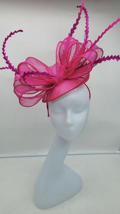 Elegant Hot Pink sinamay Fascinator. Has a headband and hair clip for a secured and comfortable look. This will be a great way to add elegance to any, bridesmaid, rehearsal dinner, Wedding guest, cocktail party, or church outfit. Spring Party Sinamay Headpiece, Spring Party Headpieces In Sinamay, Adjustable Costume Hat For Party At Kentucky Derby, Party Mini Hat With Adjustable Curved Brim, Adjustable Royal Ascot Costume Hats For Party, Adjustable Mini Hat For Kentucky Derby Party, Adjustable Mini Hats With Curved Brim For Party, Adjustable Mini Hat With Curved Brim For Parties, Summer Party Headpiece In Sinamay