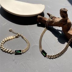 Gold tone Stainless Steel Eva Classic Emerald Jewelry Set from Glazd Jewels Trendy Green Stackable Jewelry, Modern Green Stainless Steel Jewelry, Emerald Jewelry Set, Emerald Set, Stainless Steel Chain Necklace, Emerald Necklace, Gold Piece, Emerald Jewelry, Stainless Steel Chain