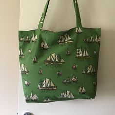 Yacht , sailing, beachy  fabric   Tote Bag Handmade Perfect for the Beach / Pool- Shopping - Lunch - Library - Gym - Carry On Luggage / Travel - Overnight - Picnic Made from New  cotton Fabric with inner phone, keys pocket.  Measures 47 wide x 44cm  long x 55 cm   strap.  Sits comfy on shoulder.  Fully lined , roomy  box base great gift.  Cold Machine Wash I have sewn my bags using new, vintage and up-cycled fabric which I have collected on my travels over the years.  The fabric may have minor i Summer Travel Fabric Shoulder Bag, Fabric Bags With Large Capacity For Summer, Summer Fabric Shoulder Bag, Summer Rectangular Fabric Shoulder Bag, Casual Fabric Shoulder Bag For Vacation, Casual Fabric Bags For Vacation, Casual Canvas Travel Bag, Casual Fabric Vacation Bag, Casual Vacation Bag