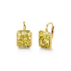 Introducing our luxurious yellow diamond drop earrings, featuring breathtaking radiant cut diamonds set in 18k yellow gold. With a VVS1-VVS2 clarity rating and a beautiful FY color, this certified piece is of the highest quality. Elegant Luxury Yellow Gold Earrings, Luxury Yellow Minimalist Jewelry, Luxury Minimalist Yellow Jewelry, Luxury Handmade Yellow Earrings, Luxury Yellow Gold Drop Earrings, Luxury Yellow Statement Earrings, Luxury Yellow Gold Brilliant Cut Earrings, Luxury Yellow Gold Solitaire Earrings, Luxury Yellow Gold Solitaire Diamond Earrings