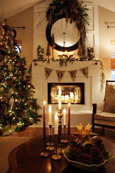 a living room filled with furniture and a fire place covered in christmas decorations next to a fireplace