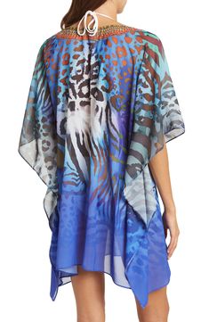 Unleash your free boho spirit in this poncho styled with vivid allover prints. 34'' length (O/S) V-neck Kimono sleeves All-over print Woven 100% polyester Dry clean Imported Model stats: 5'10", 32" bust, 25" waist, 36" hip. Model is wearing size OS. Multicolor Poncho For Beach Cover-up In Summer, Blue Printed V-neck Cover-up, Multicolor Printed Cover-up With Kimono Sleeves, Spring Multicolor Poncho For Beach, Spring Beach Multicolor Poncho, Spring Multicolor Beach Poncho, Multicolor One-size Poncho For Vacation, Multicolor One Size Poncho For Vacation, Multicolor Poncho For Beach Cover-up