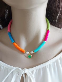 Colorful necklace is an excellent and elegant gift for your lovelies. Heishi necklace is made of colorful heishi bead and gold plated shamrock apparatus. You can wear the beach necklace to a wedding party and look very special. Pearl necklace is a nice Christmas gift, Valentine's Day gift, wedding gift, birthday gift, bridesmaid gift and other special day gift for her. Your beach necklace will be put in a nice tulle sachet. Heishi Beads Strand Necklaces As Gift, Colorful Heishi Bead Necklaces For Gifts, Colorful Bead Strand Necklace For Gift, Heishi Bead Necklace With Heart Beads Gift, Multicolor Strand Necklace As Gift, Multicolor Strand Necklace For Gift, Gift Necklace With Heart Heishi Beads, Collier Heishi, Pearl Necklace Colorful