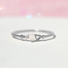 Our love is a forever type of thing! This ring features two petite hearts. It's feminine and simple and the perfect stacking ring. Promise Rings Cheap, Cute Promise Rings Silver, Simple Silver Promise Rings, Simple Promise Rings For Her Silver, Dainty Promise Rings Silver, Small Rings Simple, Small Promise Rings, Promise Rings Simple Silver, Cute Promise Rings Girlfriends