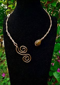 Handmade Spiral Brown Jewelry, Unique Brown Spiral Jewelry, Adjustable Spiral Bronze Jewelry, Adjustable Bronze Spiral Jewelry, Bronze Wire Wrapped Spiral Jewelry, Bronze Spiral Wire Wrapped Jewelry, Bohemian Spiral Hand Wrapped Jewelry, Spiral Copper Necklace In Gold Color, Gold Spiral Necklace In Copper