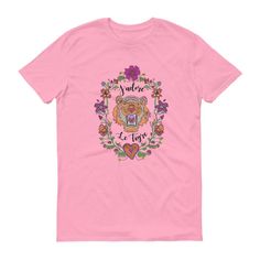 a pink t - shirt with an image of a bear and flowers on the chest