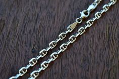 Sterling silver mariner chain necklace 3.7 mm, solid silver 925 marina chain with lobster clasp good and secure lock.  Silver mariner chain necklace.  Silver anchor link chain necklace. All chains come with soldered closed jump ring (at lobster clasp) to prevent them from coming off.  We care! and closely check for quality. Dimensions  :  width  3.7 mm x 6 mm (link dimensions) Weights        :  18"   12.6 grams (approx) ♥ If you want any different length chain from available options, please cont Anchor Chain, Necklace Sterling Silver, Chains For Men, Chain Link Necklace, Jump Rings, Men Necklace, Sterling Silber, Chains Necklace, Silver 925