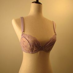 This Is An Unlined Lace Bra From Victoria's Secret In A Size 32c. The Bra Is New, With Tags Still Attached. The Color Is Lavender And The Lace Design Is Absolutely Stunning. The Bra Is A Part Of The Vs Designer Collection And Originally Priced At $98. Purple Fitted Bra With Removable Pads, Fitted Purple Bra With Removable Pads, Sheer Fitted Push-up Bra, Lavender Push-up Bra, Sheer Fitted Underwire Bra, Fitted Sheer Underwire Bra, Sheer Fitted Low-cut Bra, Fitted Sheer Low-cut Bra, Low-cut Sheer Fitted Bra