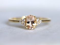 an engagement ring with two stones on it