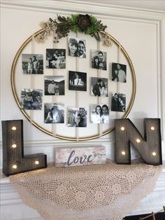 a circle with lights around it and some photos on the wall next to letters that spell out love