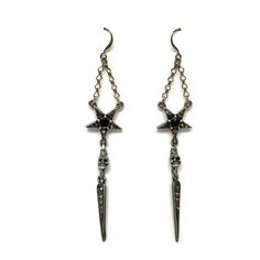 "Morning Star Spike Dangle Earrings Morning star has Black crystal centers and Vitrail details in the points of the star. Mini skulls with Vitrail details in the dangling spike. This earrings are roughly 4\" in length. lead free pewter All pieces are made-to-order despite the \"in stock\" number in the listing. Time frame varies from piece to piece so please message us if you need something by a certain date and we will do our best. A portion of our profits will be regularly donated to organizat Edgy Star-shaped Metal Jewelry, Punk Style Star-shaped Metal Earrings, Gothic Star-shaped Party Jewelry, Edgy Star-shaped Pierced Earrings, Edgy Star-shaped Jewelry With Star Charm, Gothic Silver Star Earrings, Gothic Star-shaped Metal Earrings, Gothic Star Shaped Metal Earrings, Silver Star Gothic Earrings