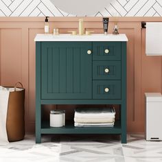 a bathroom vanity with green cabinet and white counter top, next to a brown vase