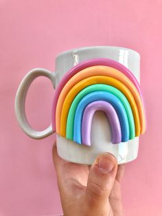 Hand-decorated coffee mug. Please hand wash and do not microwave. This cheerful mug features colorful 3d designs, see the dropdown for options. Rainbows, mushrooms, smiley flowers, retro rainbow swirls, etc! This handmade coffee mug is the perfect statement piece for a happy kitchen, adding colorful vibes. Perfect gift for coffee mug collectors or coffee lovers alike. | Colorful 3D Coffee Mug, Handmade Ceramic Mug, Rainbow Mug, Modern Happy Coffee Lover Gift, Mushroom Mug, Cute Coffee Mugs, Cera 3d Coffee, Rainbow Mug, Pastel Home Decor, Diy Gifts For Dad, Mugs Ceramic, Happy Coffee, Diy Mugs, Vase Crafts, Mug Handmade