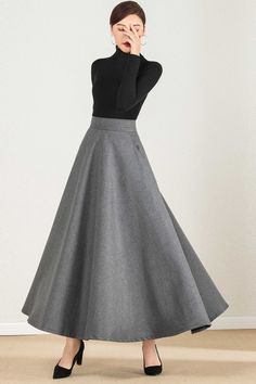 Winter Wool A-line Skirt, Chic A-line Wool Skirt, Formal A-line Winter Skirt, Fitted A-line Winter Skirt, Classic A-line Wool Skirt, Classic Wool A-line Skirt, Elegant Fall Skirt With Wide Hem, Fall Wide Hem Lined Skirt, Classic Wool Flared Skirt