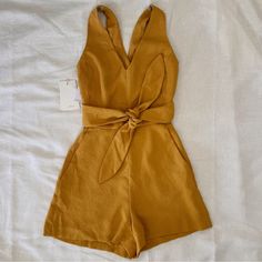 Nwt. Color Is Cairo Gold (Mustard Yellow) Crepette Material Yellow Sleeveless Jumpsuit For Work, Yellow Sleeveless Jumpsuits And Rompers For Work, Casual Yellow Jumpsuits And Rompers For Work, Yellow Jumpsuit For Spring Workwear, Yellow Jumpsuits And Rompers For Spring Workwear, Spring Yellow Jumpsuits And Rompers For Workwear, Yellow V-neck Jumpsuits And Rompers For Work, Yellow V-neck Jumpsuits And Rompers For Day Out, Fitted Yellow Jumpsuits And Rompers