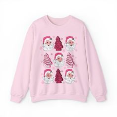 Christmas Tree Cake Sweatshirt, Pink Santa Sweatshirt, Funny Holiday Pullover, Retro Hippy Santa Shirt, Preppy Christmas Sweatshirt 💫Ideal for any situation, a unisex heavy blend crewneck sweatshirt is pure comfort. 💫 Made with a medium-heavy fabric blend of 50% cotton and 50% polyester, this sweatshirt feels cozy and is the perfect choice for those colder months. 💫 Made using 100% ethically grown US cotton. Gildan is also a proud member of the US Cotton Trust Protocol ensuring ethical and su Winter Crew Neck Sweatshirt With Cartoon Print, Winter Cartoon Print Crew Neck Sweatshirt, Pink Long Sleeve Christmas Sweater, Christmas Long Sleeve Tops With Cartoon Print, Casual Pink Christmas Sweater, Pink Tops As Winter Gifts, Casual Christmas Sweatshirt With Cartoon Print, Pink Crew Neck Top For Christmas, Holiday Crew Neck Top With Cartoon Print