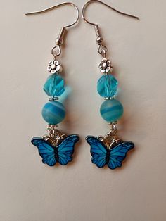 Turquoise butterfly dangle earrins Blue Butterfly Charm Dangle Earrings, Handmade Blue Butterfly Earrings, Blue Dangle Earrings With Butterfly Charm, Blue Butterfly Charm Earrings For Gift, Handmade Turquoise Butterfly Jewelry, Acrylic Nails Almond Shape, Turquoise Butterfly, Almond Acrylic Nails, Almond Shape