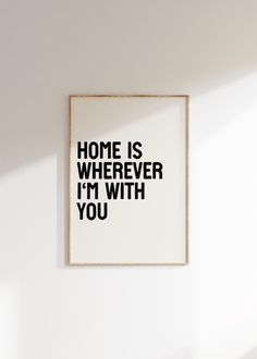 a black and white poster with the words home is wherever i'm with you