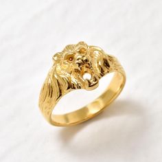 Gold Lion Ring in a Artistic design made of Gold Vermeil ☞ thickest 18k Gold Plating on top of Solid 925 Sterling Silver ☞ made to last. Matching Set - please ask me ☞ Choose your size ☞ I resize (before shipping) for FREE to Any size* *Sizes 13-16 U.S. need to be custom made & May include an additional cost, I will contact you before starting work on those custom-made sizes with all the details. Details :  ♥ Each item comes in a cute GIFT BOX ✓ ♥ GUARANTEE on the materials ✓ ♥ Pure Solid 925 Sterling Silver ☞ only Solid Pure Silver - made to last ✓ ♥ Gold Vermeil: Thickest 3 Micron Gold plate on Solid 925 Sterling Silver ✓ ♥ More Beautiful jewellery on www.etsy.com/shop/AdinaStone ☜  ✉ ✉ Shipping by Royal Mail ✉ ✉ Tracked Shipping Option - worldwide tracking - choose at checkout: U.K. 1 D Lion Ring, Gold Lion, Zodiac Rings, Head Ring, Animal Rings, Ring Vintage, Antique Rings, Pure Silver, Silver Band