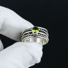 Green Peridot Spinner Rings, 925 Sterling Silver, Handmade Rings, August Birthstones, Peridot Silver Rings, Meditation Ring, Gift For Her Product Details: Gemstone : Peridot Metal : 925 Sterling Silver Item : Ring Approx Weight : 6 grams ABOUT PERIDOT ♥ Healing ♥ Renewal ♥ Purification ♥ Rebirth ♥ Growth ♥ Relaxation ♥ Comfort ♥ Intuition Peridot is a powerful cleanser. It releases and neutralises toxins on all levels. Alleviates jealousy, resentment, spite, bitterness, irritation, hatred and greed. Reduces stress, anger and guilt. Peridot opens our hearts to joy and new relationships. It enhances confidence and assertion, motivating growth and change. STYLE STATEMENT Looking for the perfect ring? Well, you've just found it. This dazzling ring from SD is perfectly crafted to suit you. OUR Silver Peridot Birthstone Ring, Silver Ring With Peridot Birthstone, Silver Peridot Ring With Birthstone, Green Sterling Silver Stackable Crystal Ring, Green Stackable Sterling Silver Crystal Ring, Stamped 925 Peridot Ring For May Birthstone, Silver Peridot Round Rings, Silver Peridot Rings Fine Jewelry, Silver Peridot Rings In Fine Jewelry Style