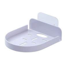 a white plastic holder with four holes