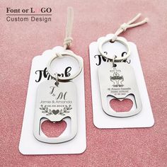 two bottle openers that are on top of a pink surface with the words true love