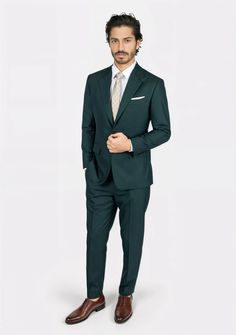 Experience statement-making style in the Astor Sacramento Green Suit. This crowd favorite and best seller features a unique look thanks to its vibrant green color and sharkskin weave. Crafted with attention to detail, this custom-made suit turns heads wherever it's seen. Green Formal Suit With Welt Pockets, Green Suits With Welt Pockets For Semi-formal Occasions, Semi-formal Green Suits With Welt Pockets, Green Semi-formal Suits With Welt Pockets, Tailored Dark Green Business Suit, Classic Dark Green Business Suit, Green Custom Fit Suit For Semi-formal Occasions, Semi-formal Custom Fit Green Suits, Fitted Green Suit For Office