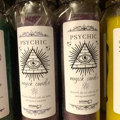 candles with all seeing and psychic symbols on them